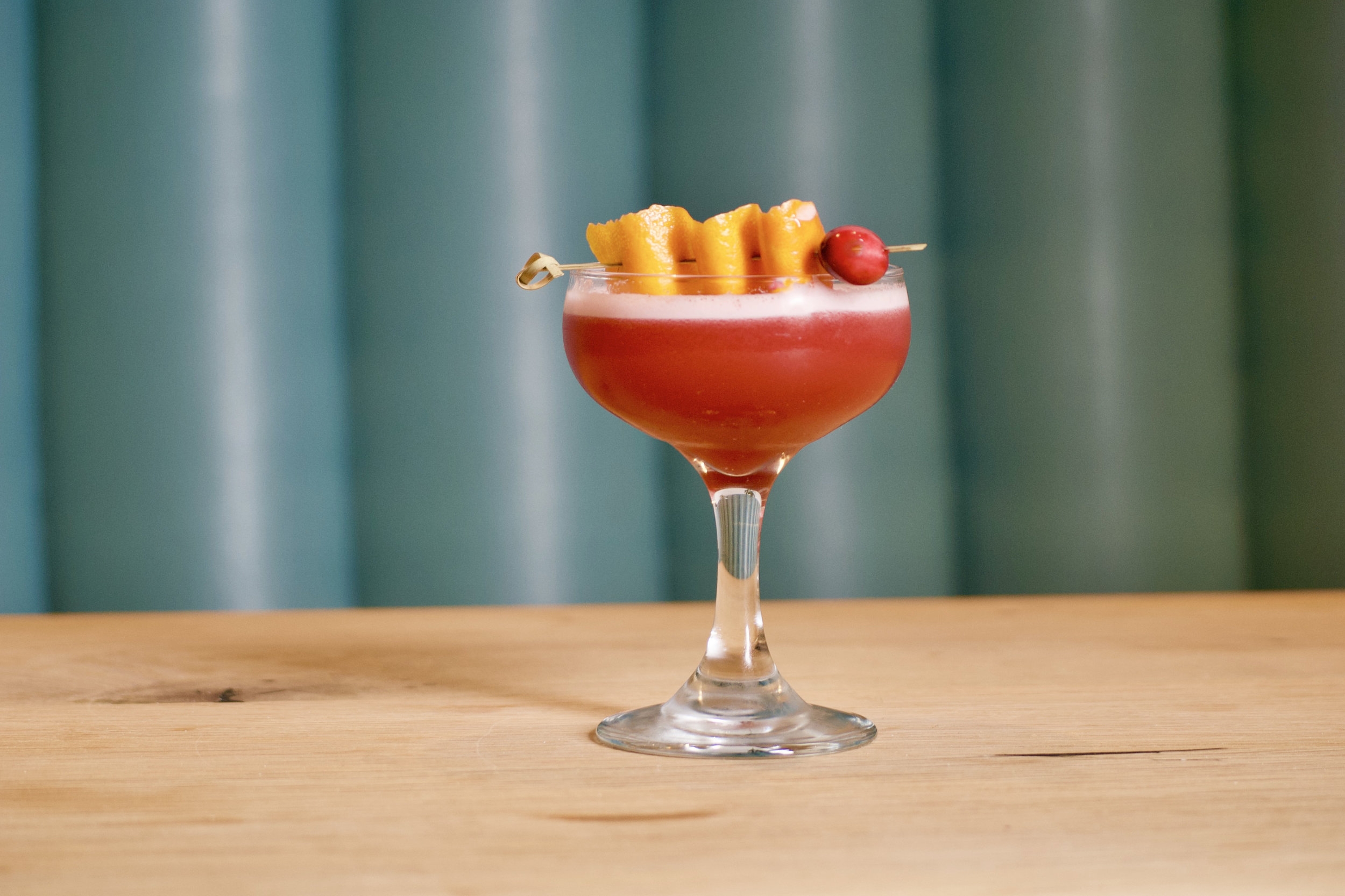 fruity drink with a kick crossword