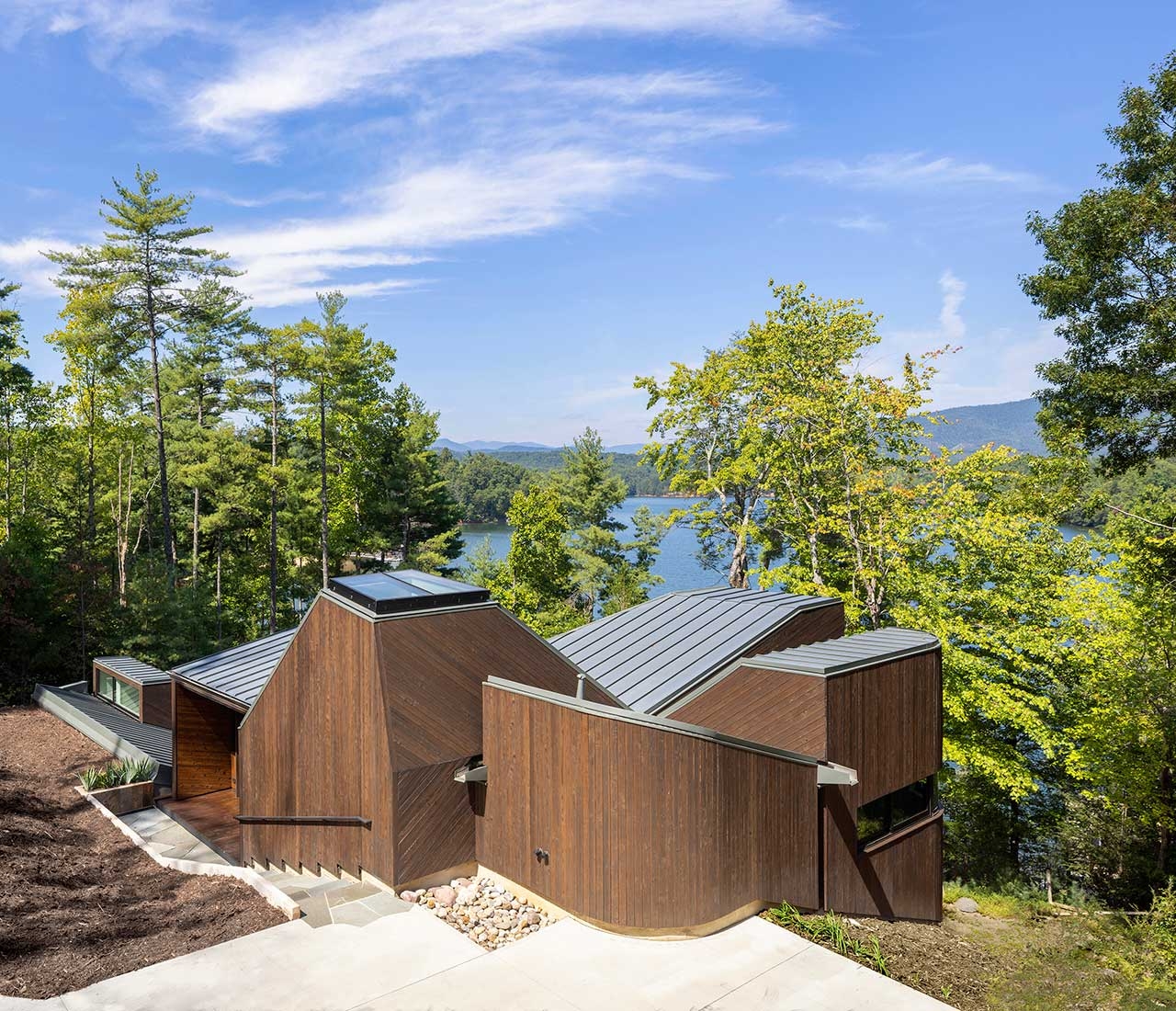 A North Carolina Lakeside House Made Of Stacked Pavilions